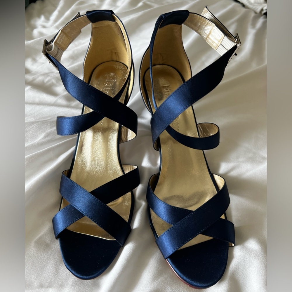 Blue satin strapped heels.